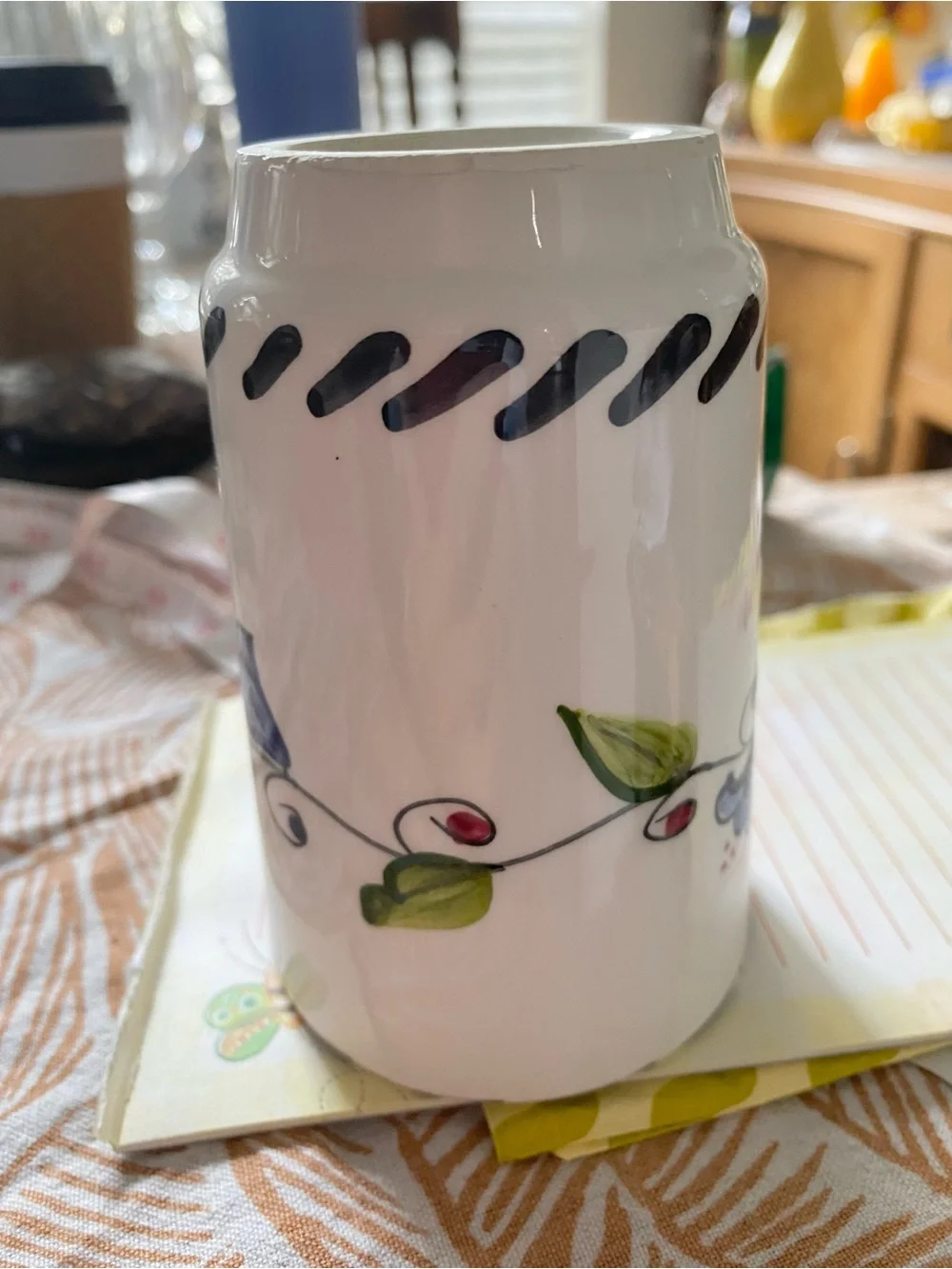 Vintage Hand-painted ceramic tumbler with floral motif. Florals pink,blue&black